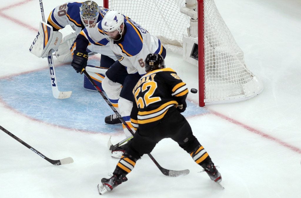 Boston Bruins' Sean Kuraly (52) scores a goal past St. Louis Blues goaltender Jordan...