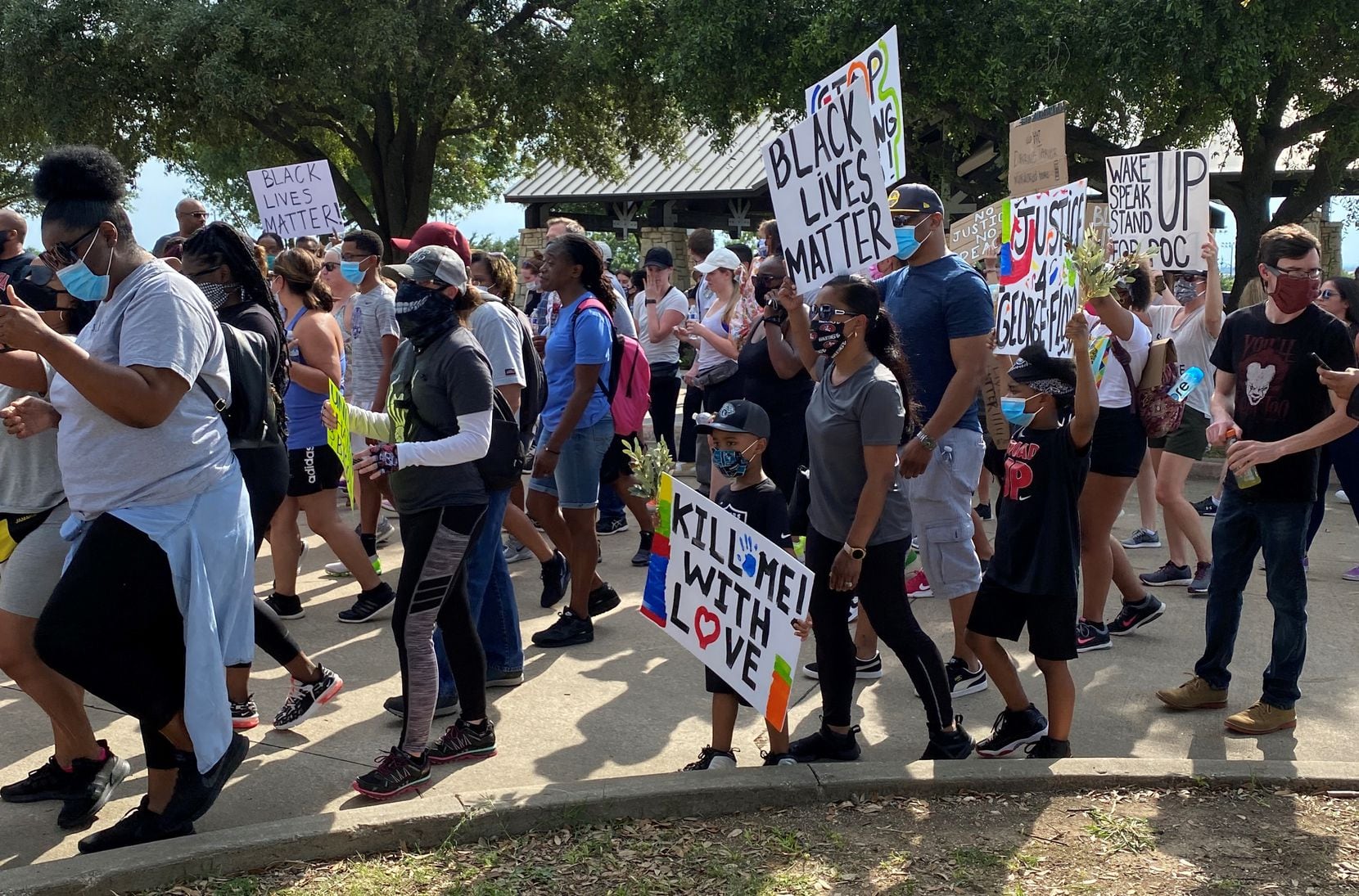 Protesters march against police violence on June 1, 2020 in Frisco, Texas.