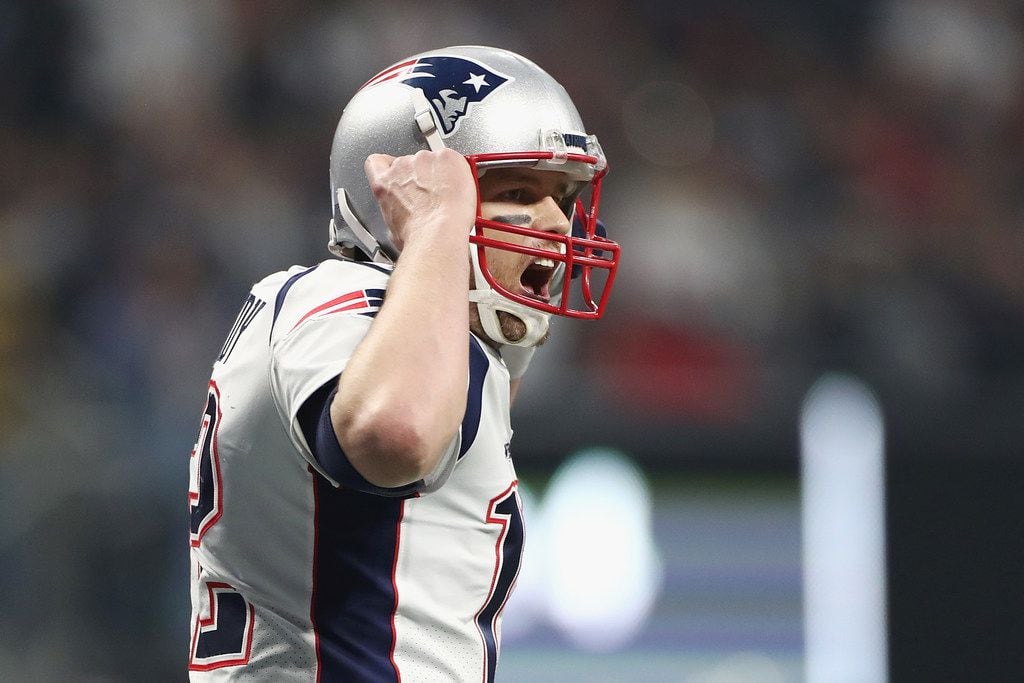 ATLANTA, GA - FEBRUARY 03:  Tom Brady #12 of the New England Patriots reacts after the New...