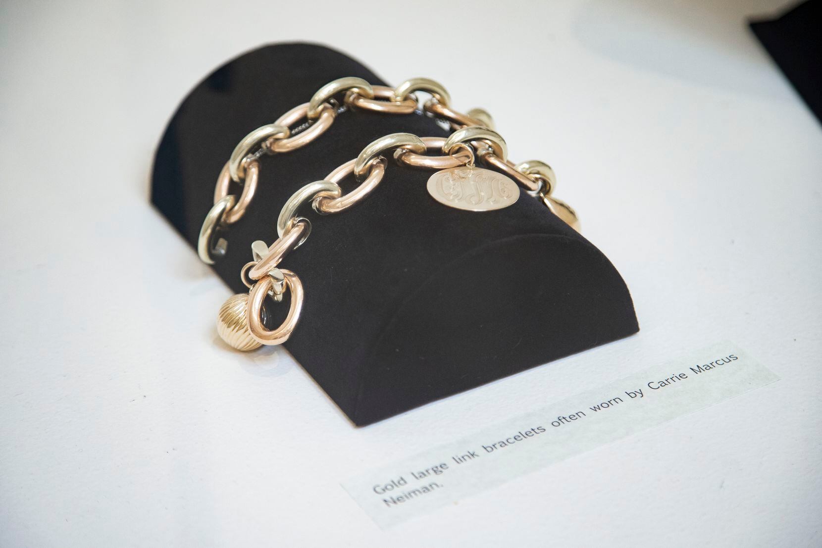 Carrie Marcus Neiman's gold large link bracelets on display in “An Eye for Elegance."