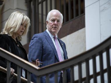 Sen. John Cornyn heads to a briefing from the Department of Homeland Security, FBI and other agencies on election security on March 10, 2020.