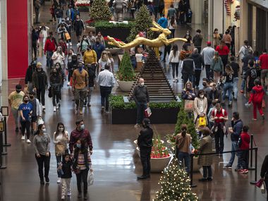 Black Friday shoppers at NorthPark Center in Dallas last year. The locally owned mall will continue its mask requirement after Texas lifts such requirements on March 10.