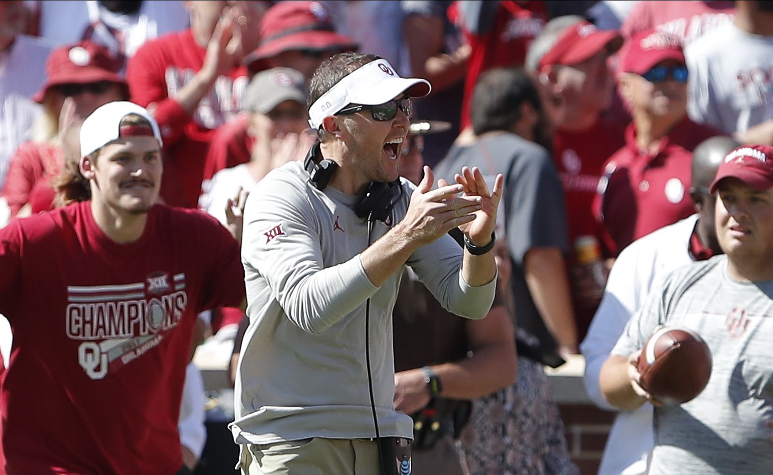 Oklahoma head coach Lincoln Riley celebrates after a blocked West Virginia kick during the...