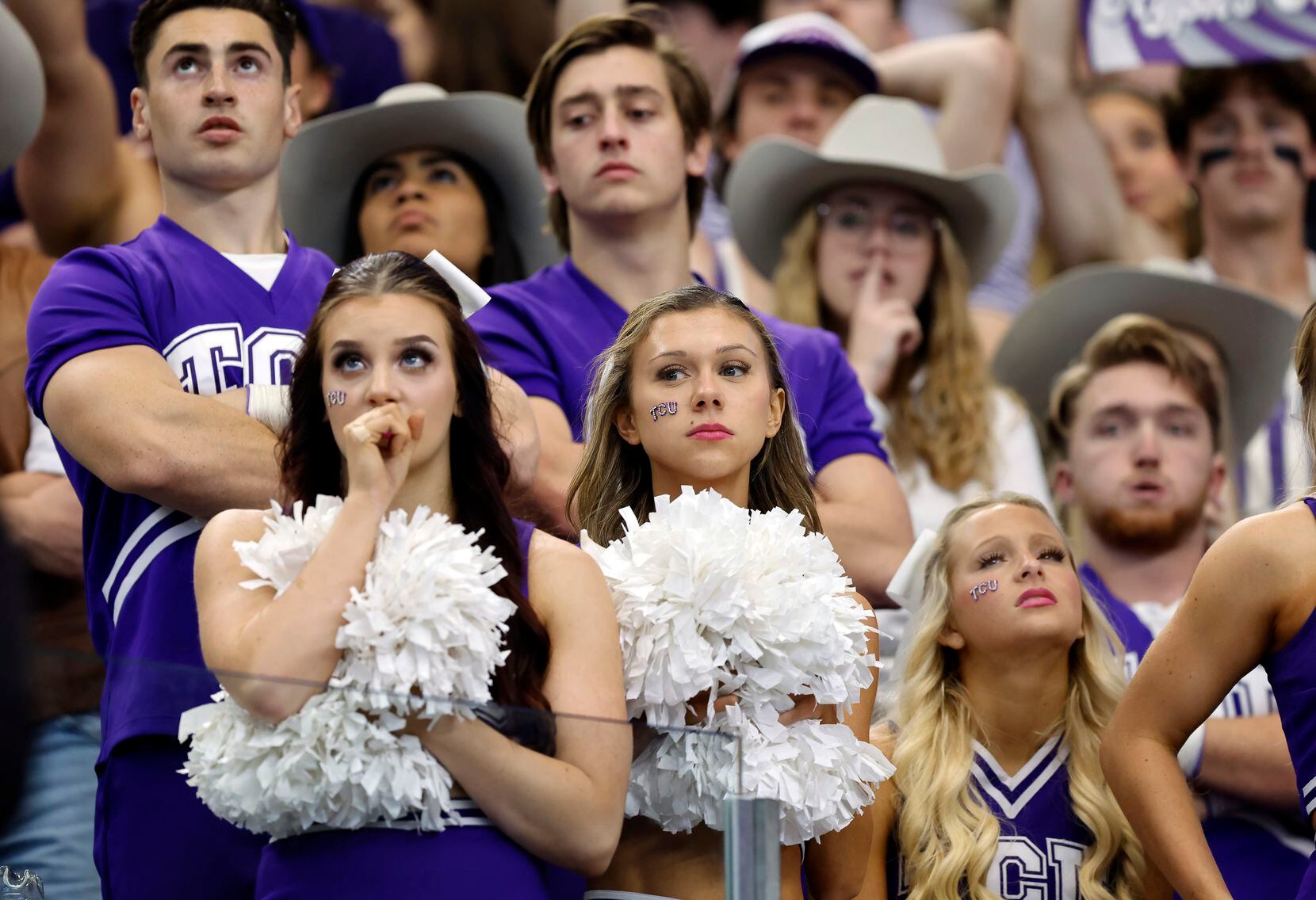 The TCU Horned Frogs cheerleaders watched as their team trialed the Kansas State Wildcats in...