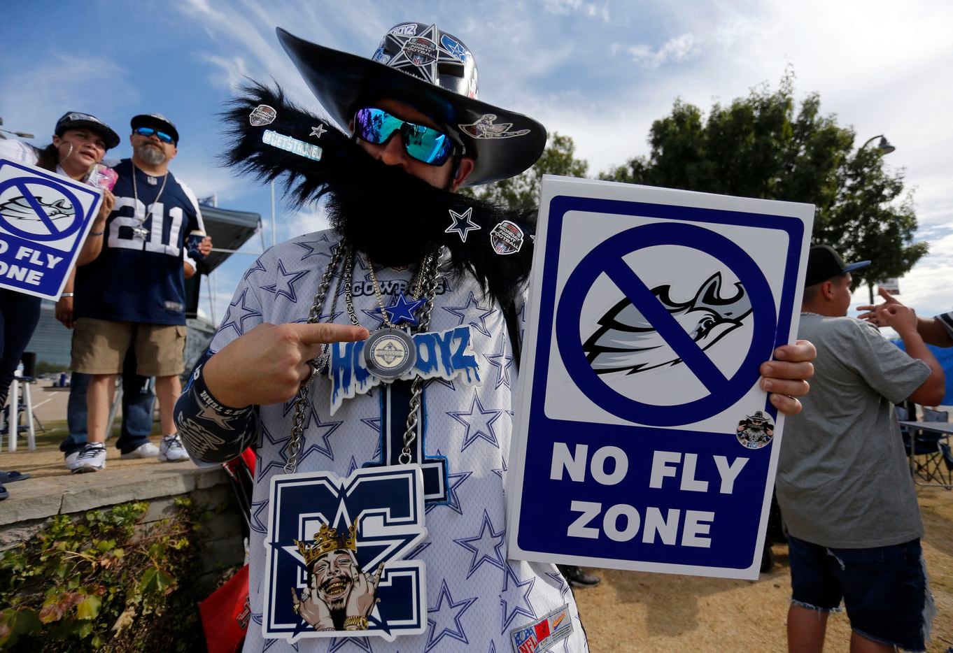 Dallas Cowboys fane Kevin “Stacheman” Baldwin, of Friso, displays his “No FlyZone” sign (meaning the Philadelphia Eagles’ passing game will be thwarted tonight), while tailgating before a NFL football game between the Dallas Cowboys and the Philadelphia Eagles High at AT&T Stadium in Arlington on Monday, September 27, 2021. (John F. Rhodes / Special Contributor)