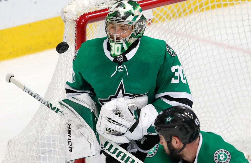 Dallas Stars goaltender Ben Bishop defends the goal during the second period of an NHL...