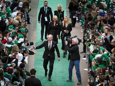 Former Dallas Stars player Sergei Zubov fist bumps fans as he arrives for his jersey retirement night prior to the Stars game against the Washington Capitals at the American Airlines Center on Friday, Jan. 28, 2022, in Dallas. 