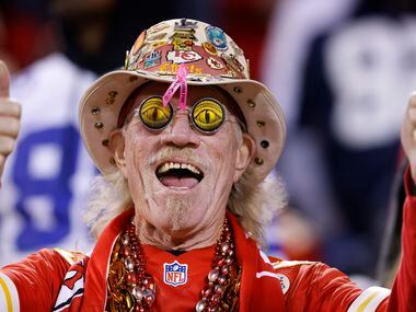 A Kansas City Chiefs fans gives a thumbs up to his team beating the Dallas Cowboys in the...