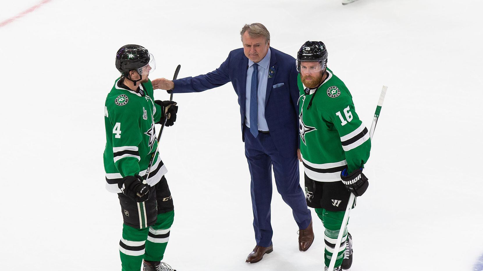 Miro Heiskanen (4), interim head coach Rick Bowness and Joe Pavelski (16) of the Dallas Stars react to their loss against the Tampa Bay Lightning during Game Six of the Stanley Cup Final at Rogers Place in Edmonton, Alberta, Canada on Monday, September 28, 2020.