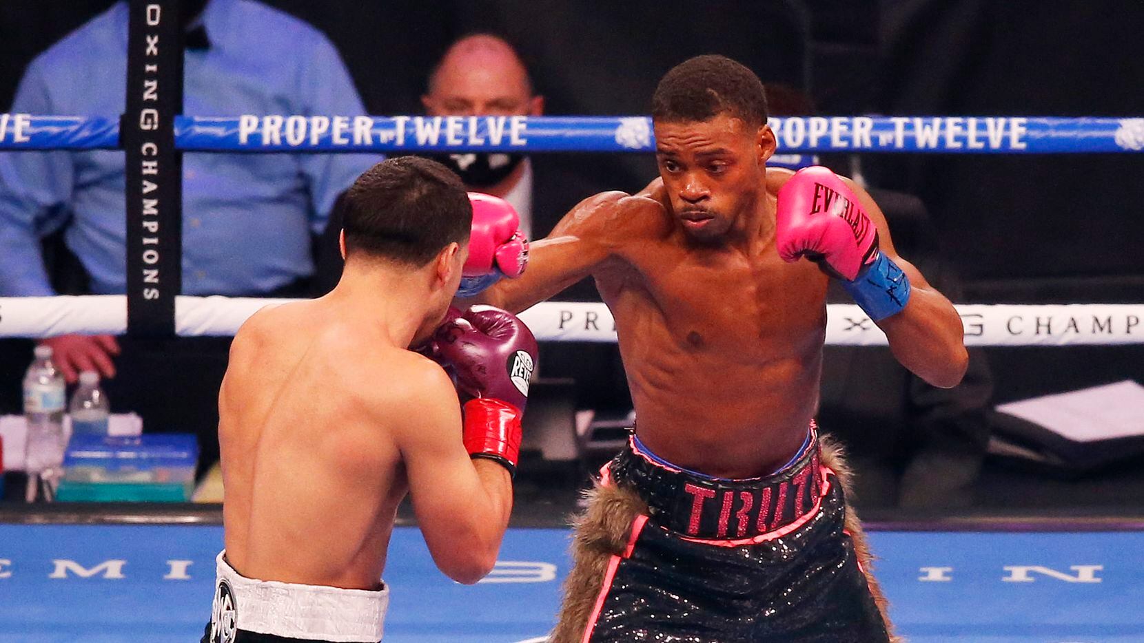 Errol Spence, Jr. and Danny García fight during the first round of a WBC & IBF World...