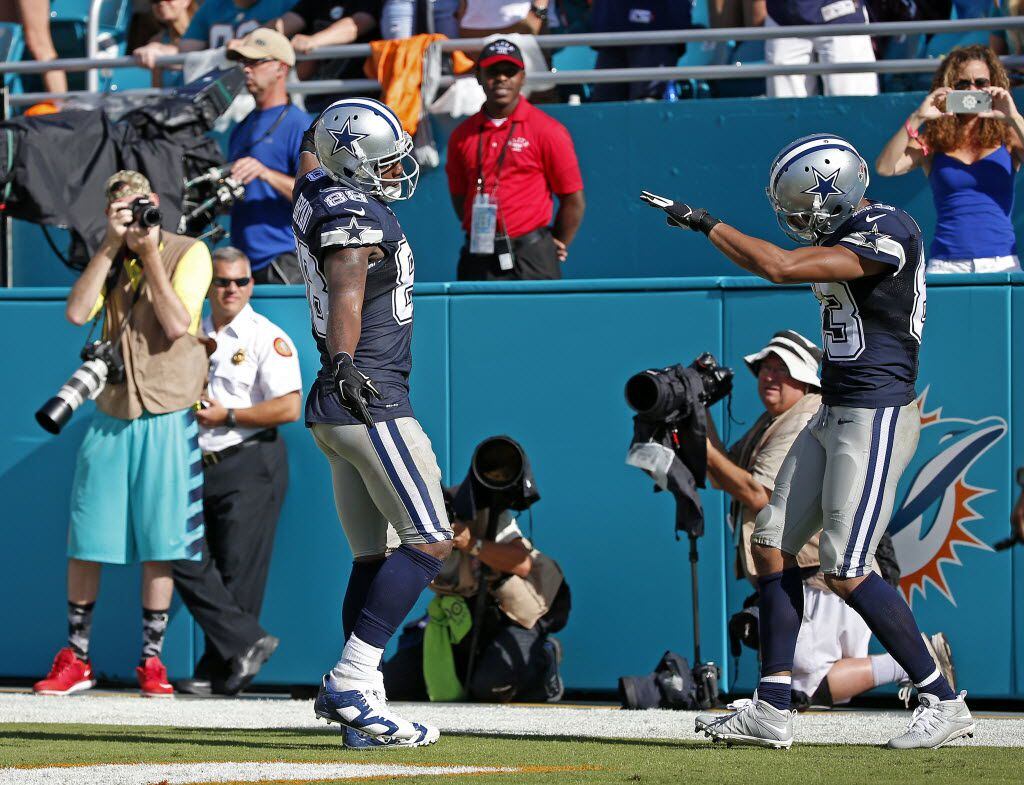 Dallas Cowboys wide receiver Terrance Williams (83) celebrates his touchdown with wide...