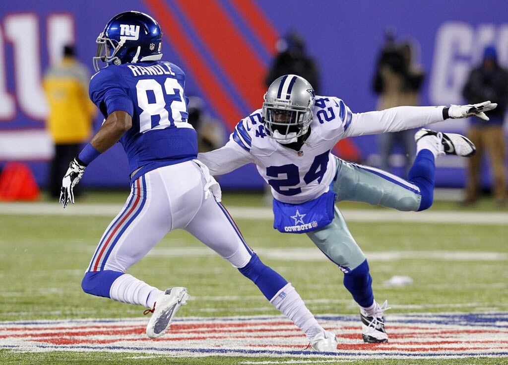 Dallas Cowboys cornerback Morris Claiborne (24) reaches for New York Giants wide receiver...