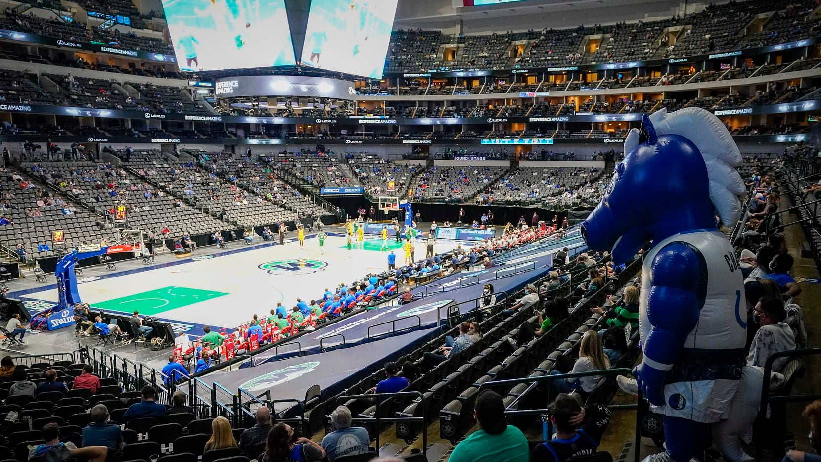 Dallas Mavericks mascot Champ watches from the stands during the second half of an NBA basketball game against the Indiana Pacers at American Airlines Center on Friday, March 26, 2021, in Dallas.