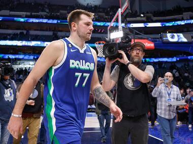 Dallas Mavericks guard Luka Doncic (77) walks off the court after an NBA game against the...