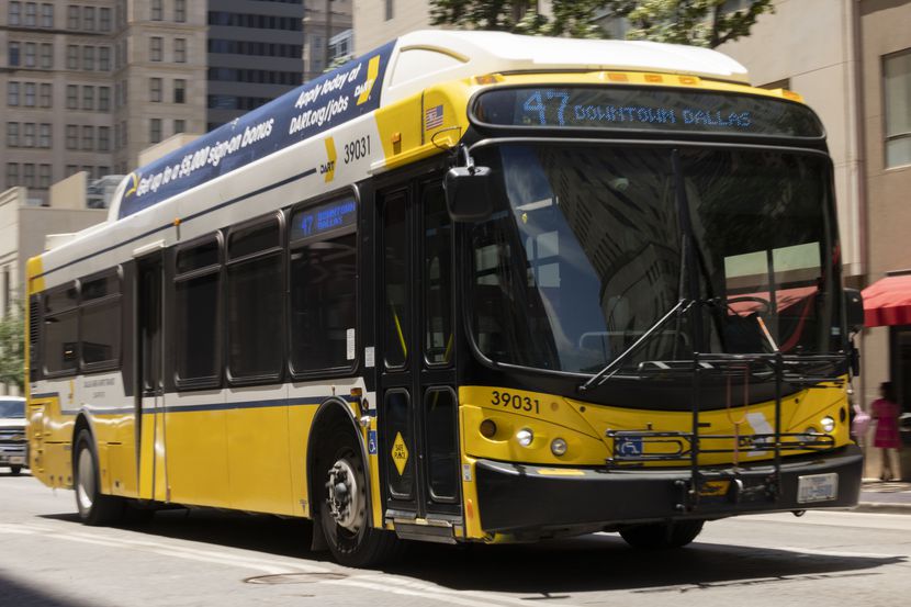 The route 47 Dallas Area Rapid Transit bus rides down Commerce Street in downtown Dallas on...