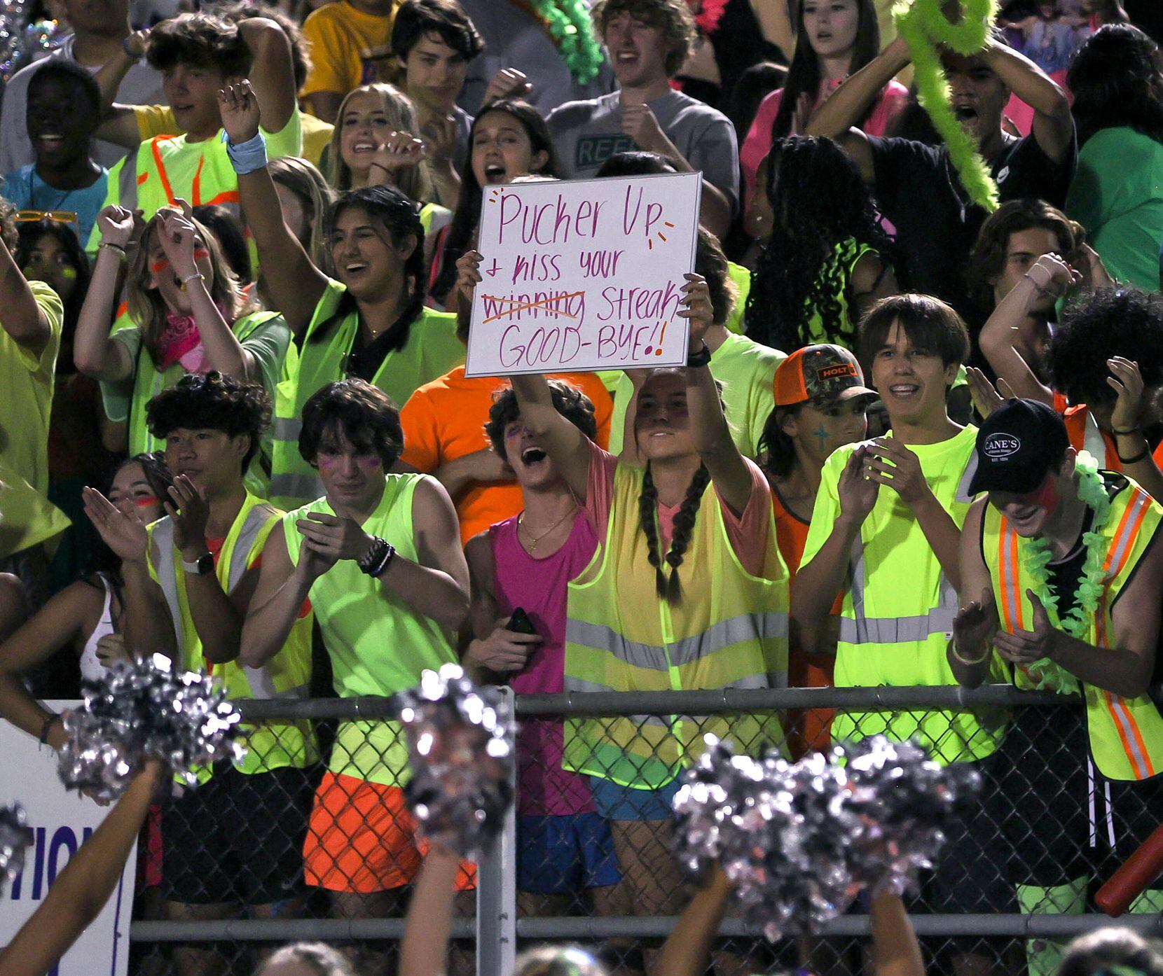 The Frisco Reedy students celebrate a victory over Frisco Lone Star in a high school...