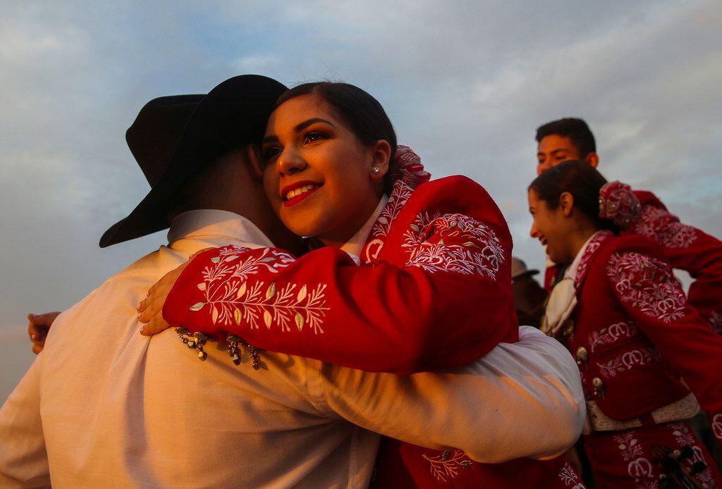 Omar Mejia  and Melanie Olivarez dance before performing during La Joya ISD's "Dia del Niño"...