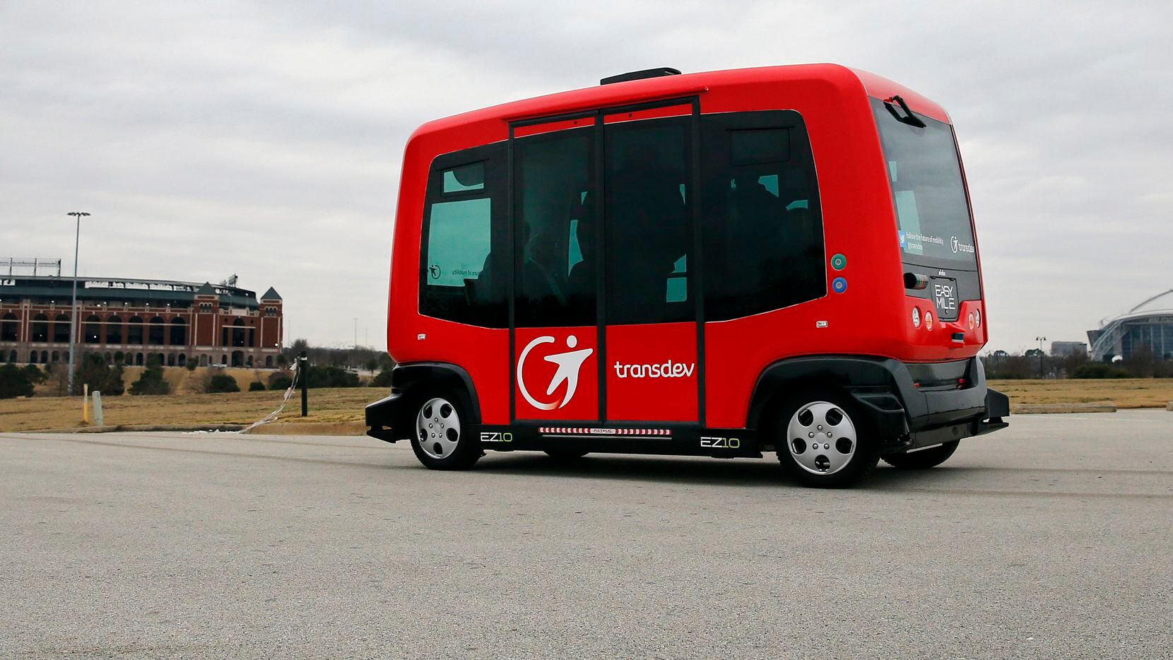 Alliance for Transportation Innovation's  EZ-10, a six-seat self-driving shuttle ferries passengers from a set location on a closed course near the Globe Life Park in Arlington, Thursday, February 2, 2017.  City of Arlington and area officials rode the programable shuttle from the Arlington Convention Center to a parking lot. Arlington is gaining popularity as a testing ground for self-driving cars. Last week, the Department of Transportation named it a "national Automated Vehicle Proving Ground." (Tom Fox/The Dallas Morning News)