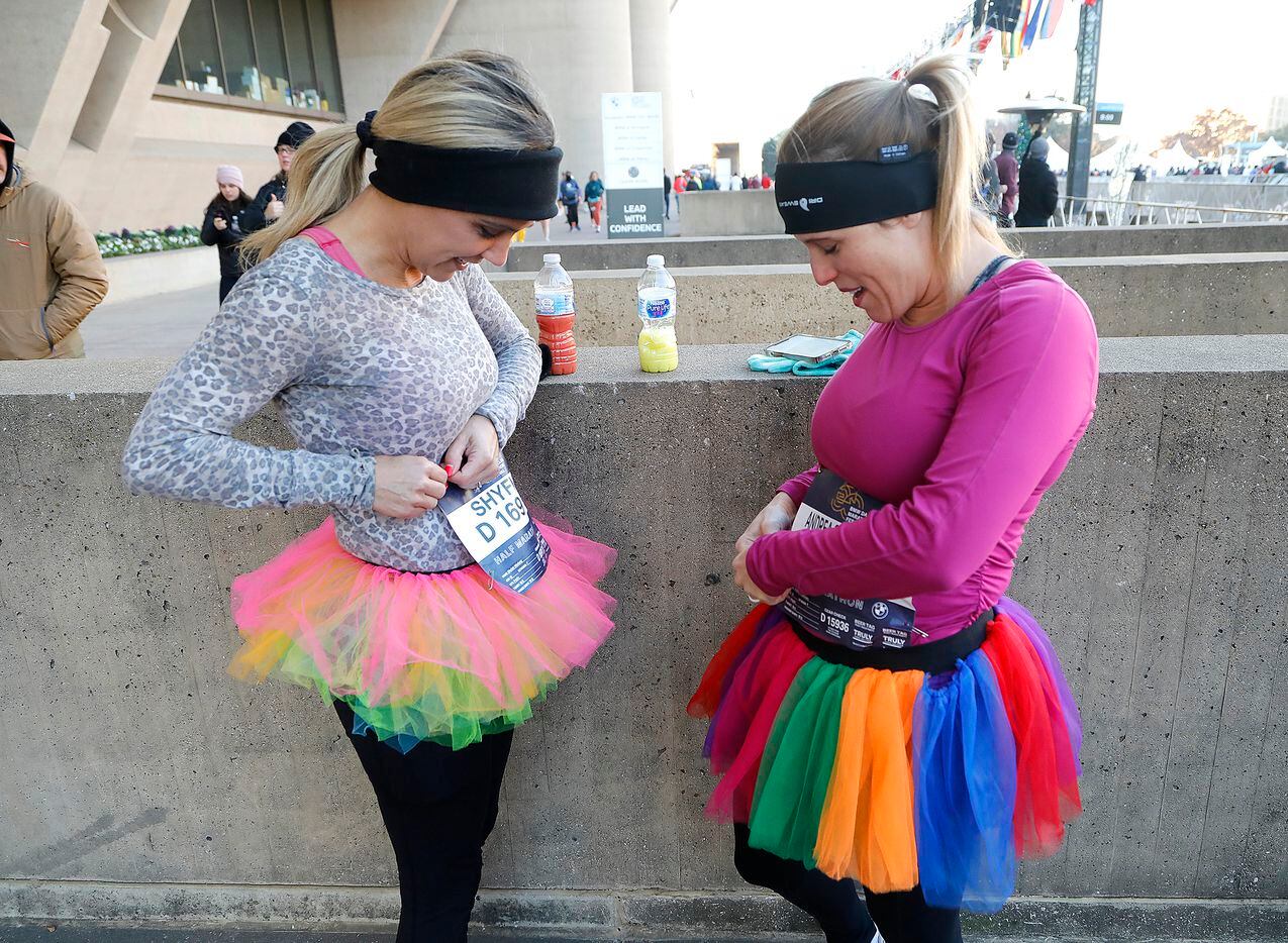 Argyle residents Shyloh Winfield (left) and Anerea Steponaitis attatch their bibs before the...