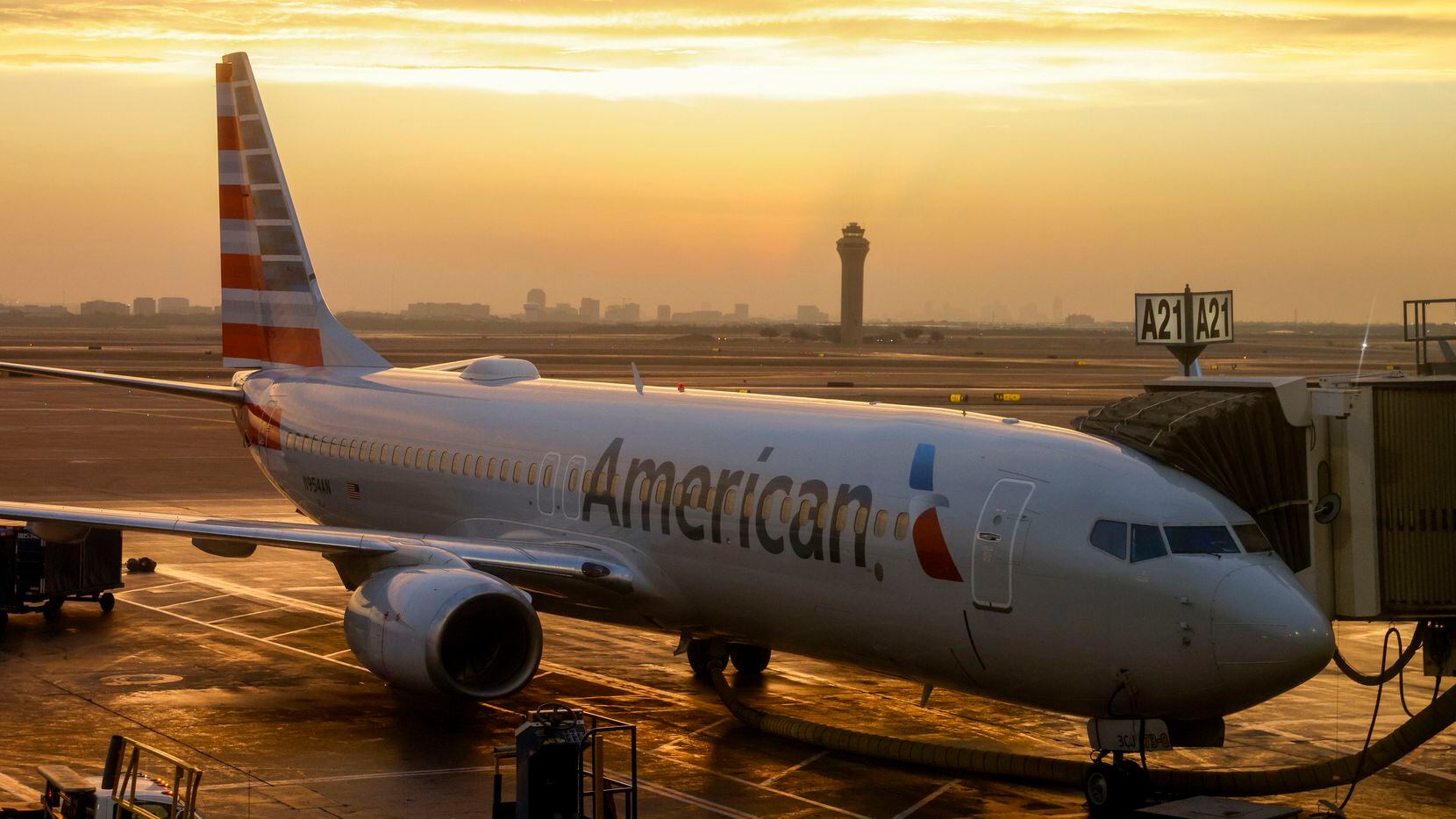 An American Airlines Boeing 737-800 sits at a gate at Terminal A at DFW International...