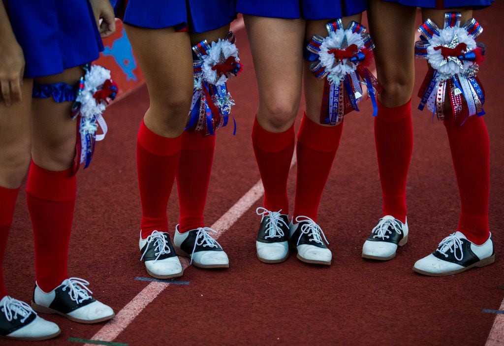 Not all mums are huge. Richardson Pearce cheerleaders showed off their homecoming mums...