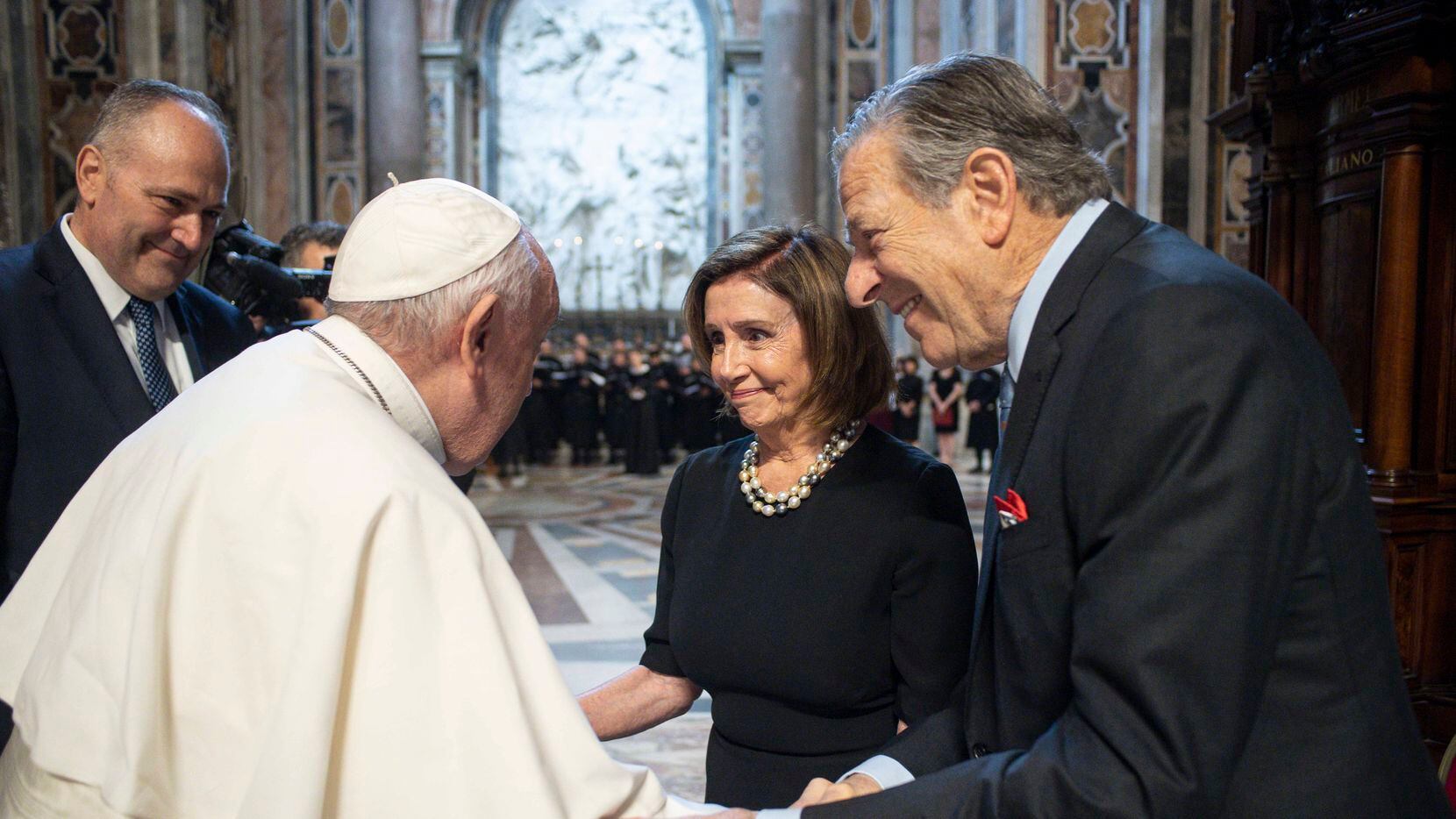Pope Francis, greets Speaker of the House Nancy Pelosi, D-Calif., and her husband, Paul...