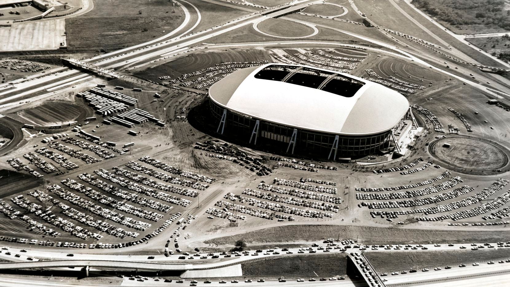Texas Stadium, long before its implosion in 2010, is seen in this file photo from 1971....
