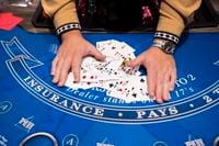 Cards are shuffled and checked on a blackjack table at Choctaw Landing on Wednesday, April...