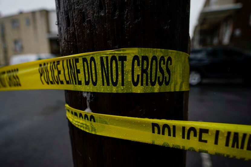 Police tape cordons off the scene. (AP Photo/Matt Rourke)