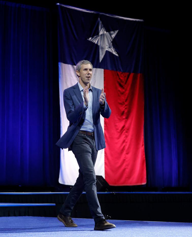 Democratic gubernatorial challenger Beto O'Rourke walks on-stage to deliver his speech to...