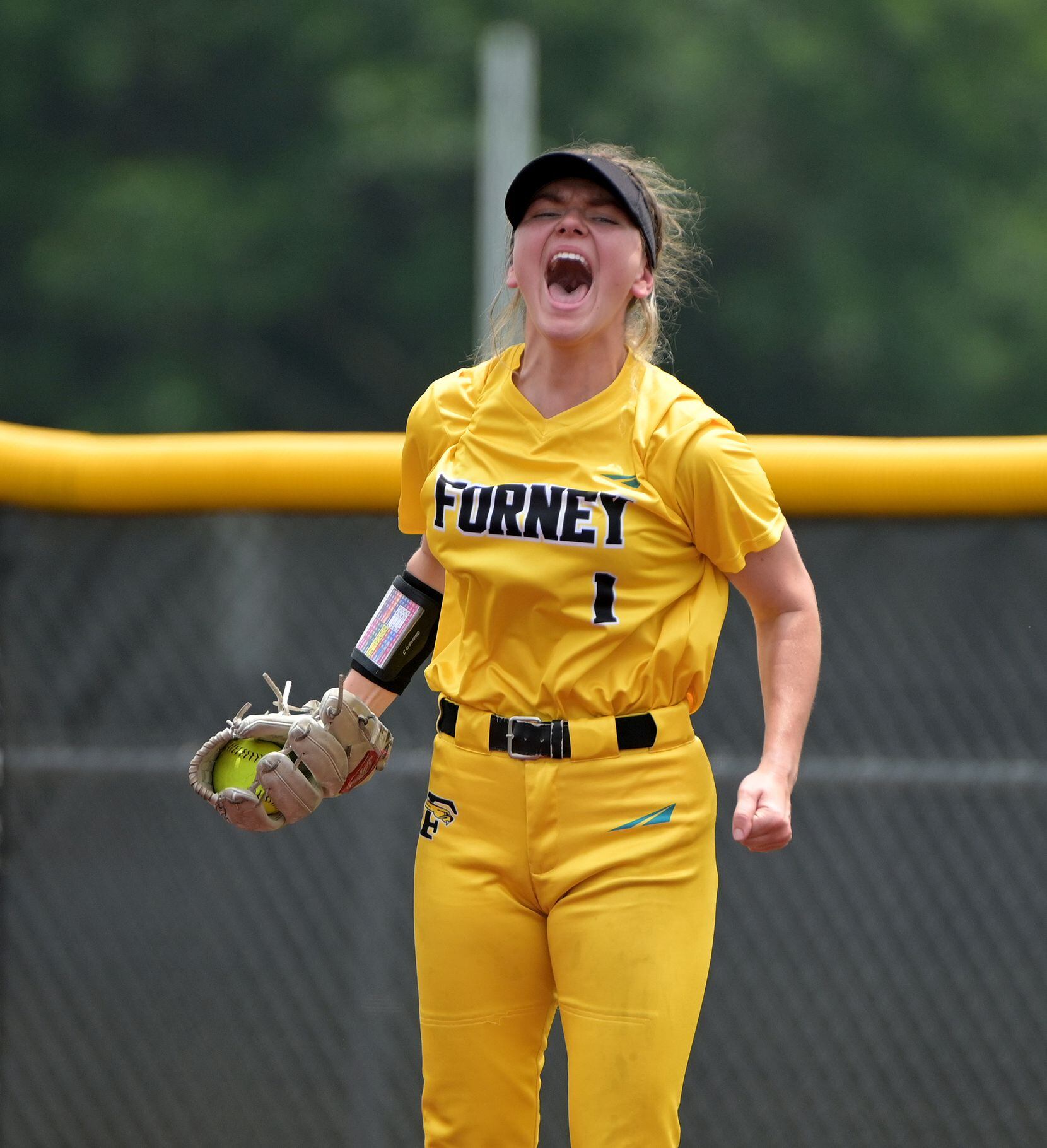 Forney’s Mary Newville (1) celebrates after making an out during game 3 of a Class 5A Region...