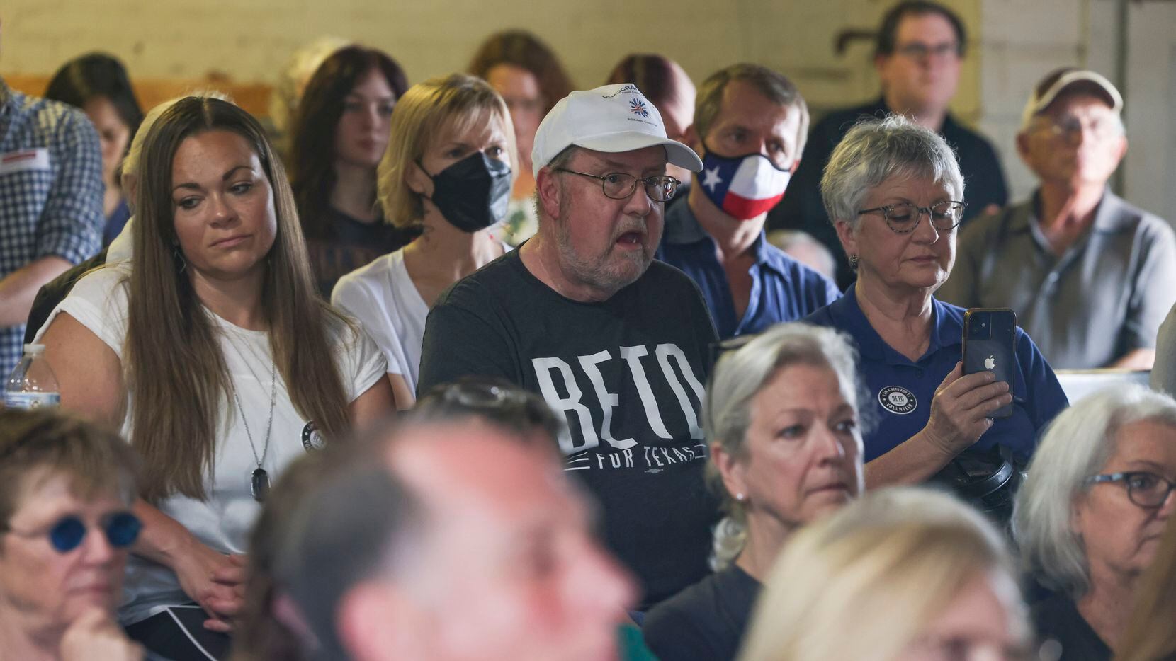 Crowd members listen and react to Beto O'Rourke speaking on Thursday, April 21, 2022 at 903...