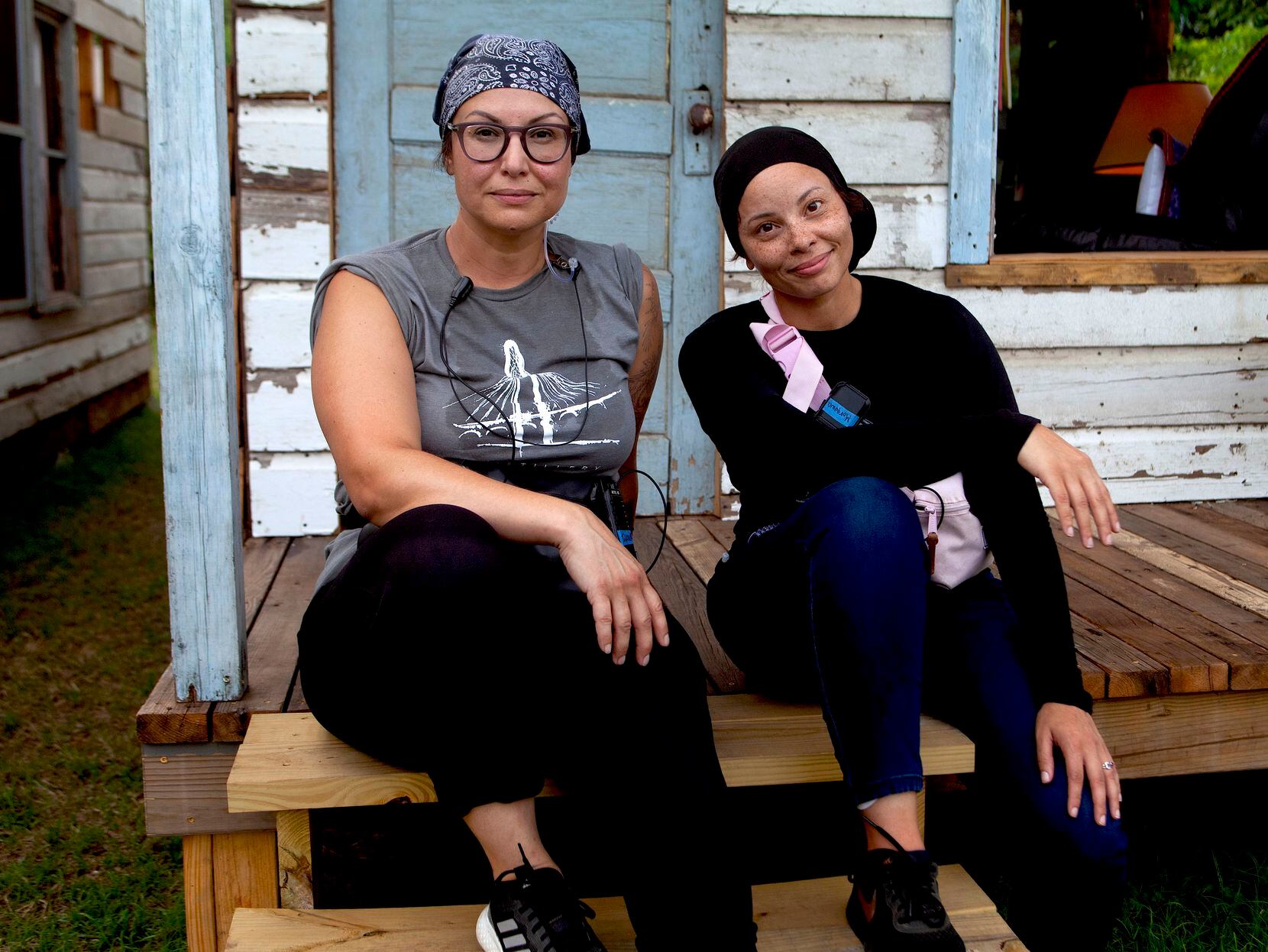 "Family Dollar" writer-directors Ilknur Ozgur (left) and Morgana Wilborn in front of the West Dallas shotgun houses where the immersive show was staged this summer.