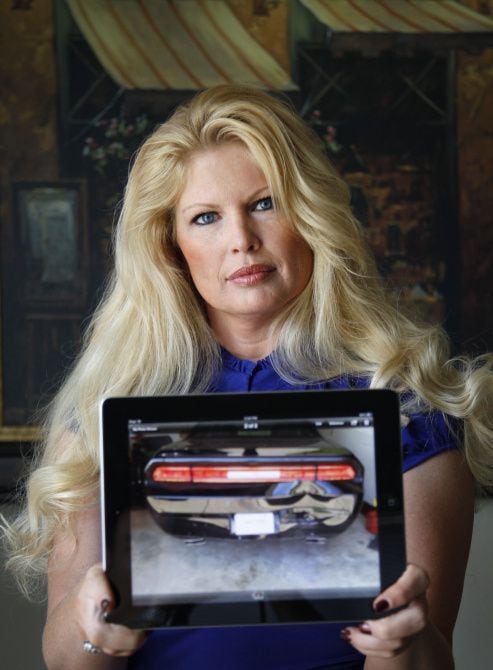 Denise Washburn's 2013 Dodge Challenger was rear-ended by a car traveling 40 mph in...