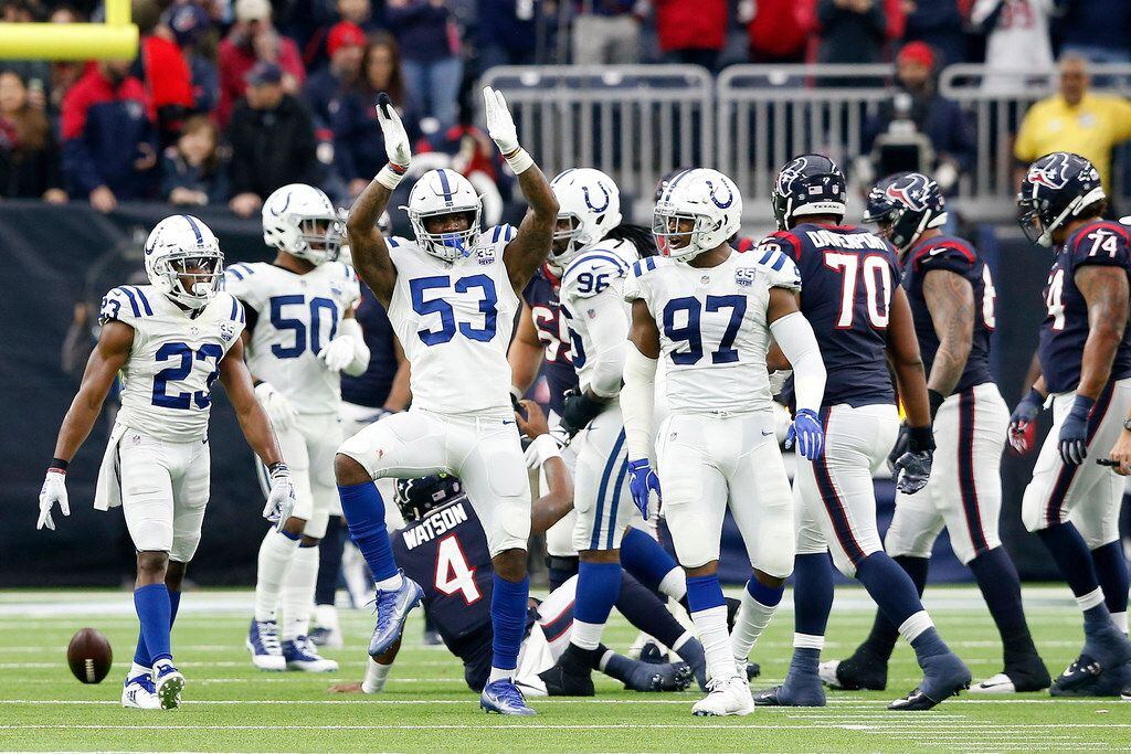 HOUSTON, TX - DECEMBER 09:  Darius Leonard #53 of the Indianapolis Colts celebrates with Al-Quadin Muhammad #97 after sacking Deshaun Watson #4 of the Houston Texans in the third quarter at NRG Stadium on December 9, 2018 in Houston, Texas.  (Photo by Tim Warner/Getty Images)