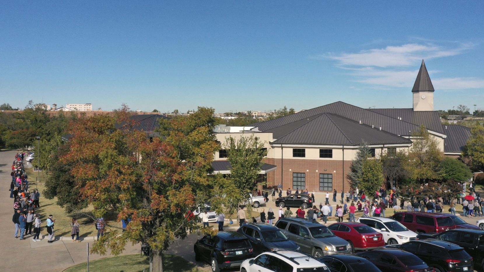 The line for early voting at a polling place in Oklahoma County wraps around the Edmond...