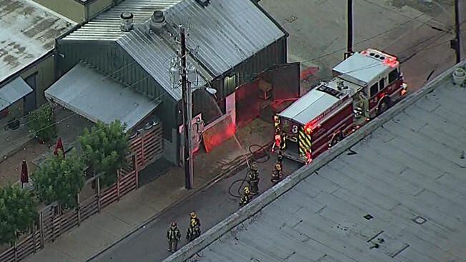 The Pecan Lodge restaurant's smokehouse in Deep Ellum caught fire early Wednesday morning. 