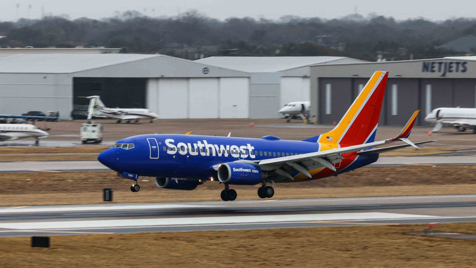 A Southwest Airlines plane lands at the runway of Dallas Love Field Airport in Dallas on...