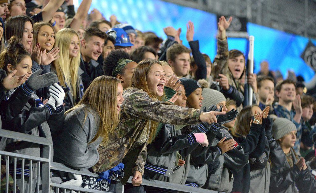 Guyer students cheer in the first half of a Class 6A Division II bi-district high school...