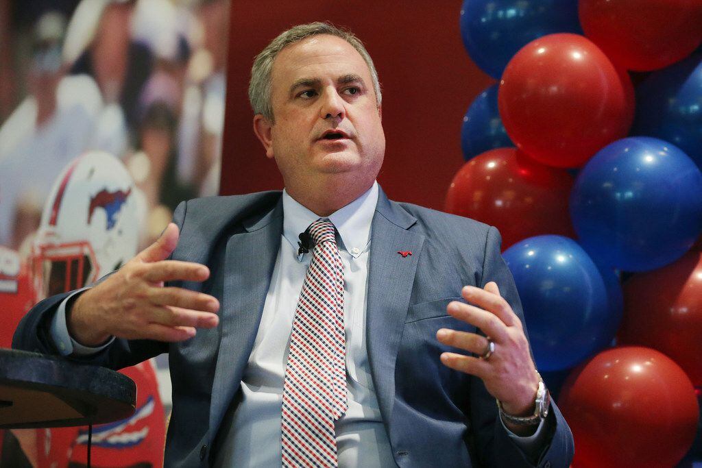New SMU head football coach Sonny Dykes speaks with Dallas Cowboys play-by-play voice Brad...