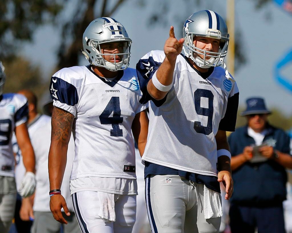 Dallas Cowboys quarterbacks Tony Romo (9) and quarterback Dak Prescott (4) are pictured...