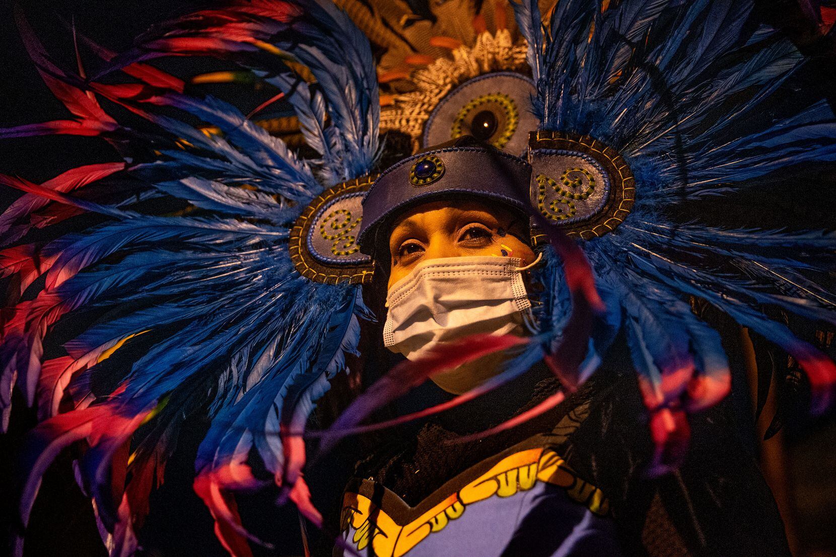 Rosario Flores, leader of Danza Chichimeca San Miguel de Arcángel, posed for a portrait after dress rehearsal for Saturday's Day of the Virgin of Guadalupe ceremonies.