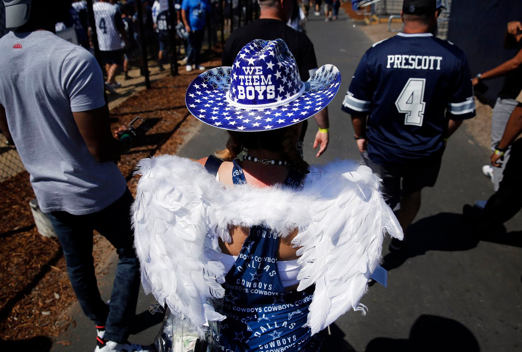 Dallas Cowboys fan Maggie Daniels of Compton, California wore her angel wings to training...