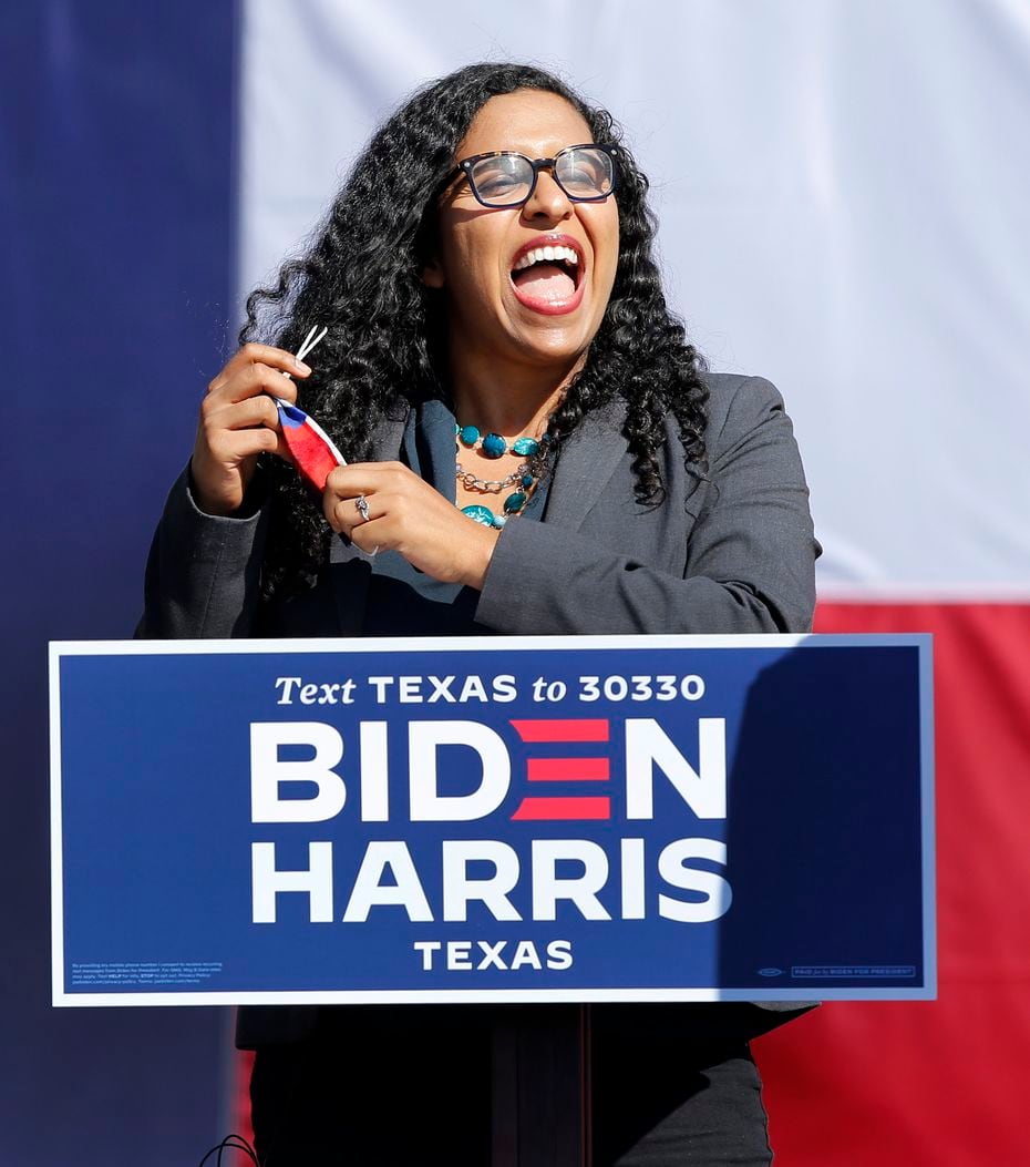 Candace Valenzuela, the Democratic candidate running for Texas' 24th Congressional District House, removes her mask to speak at former second lady Jill Biden's drive-in campaign rally stop at Fair Park in Dallas, Tuesday, October 13, 2020. (Tom Fox/The Dallas Morning News) 