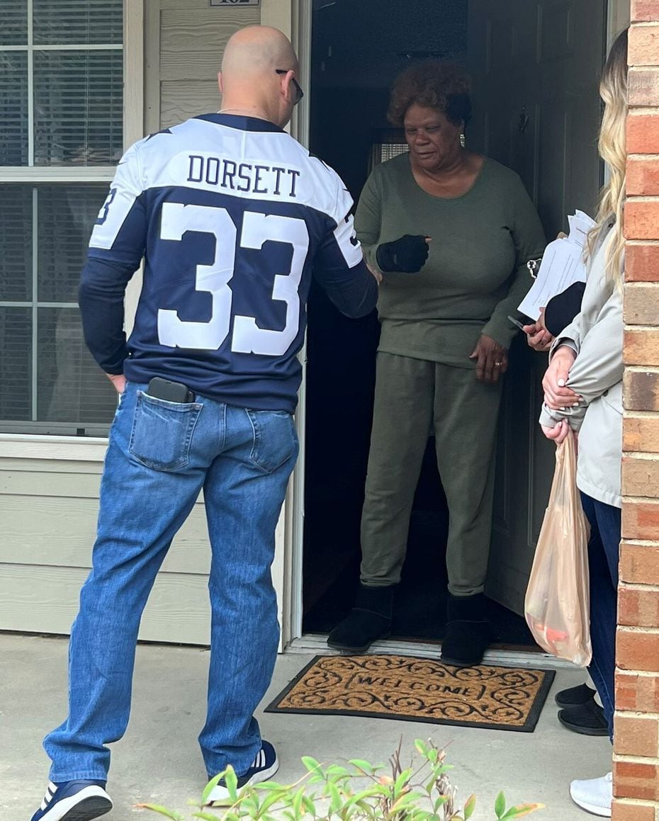 Dallas Police Chief Eddie García visited with a resident Jan. 21 during a community walk...