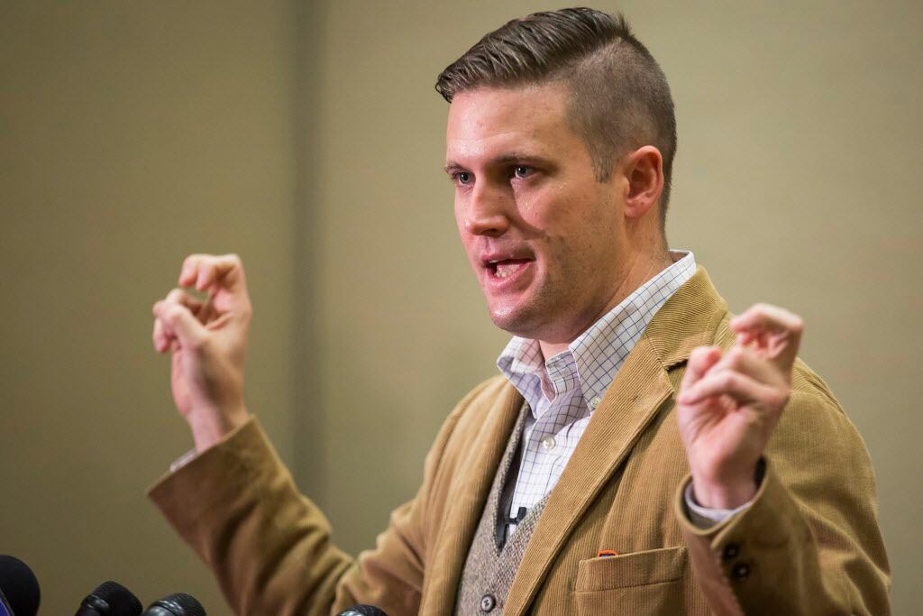 Richard Spencer addresses the media during a news conference before his speech at Texas A&M...