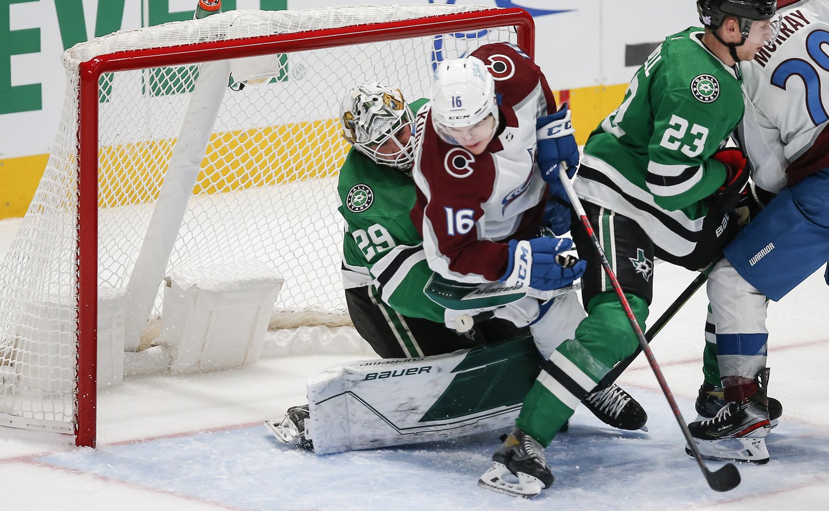 Colorado Avalanche forward Nicolas Aube-Kubel (16) collides into Dallas Stars goaltender Jake Oettinger (29) during the second period of an NHL hockey game in Dallas, Friday, November 26, 2021. Aube-Kubel was charged with a goaltender interference penalty on the play and Oettinger would leave the game. (Brandon Wade/Special Contributor)