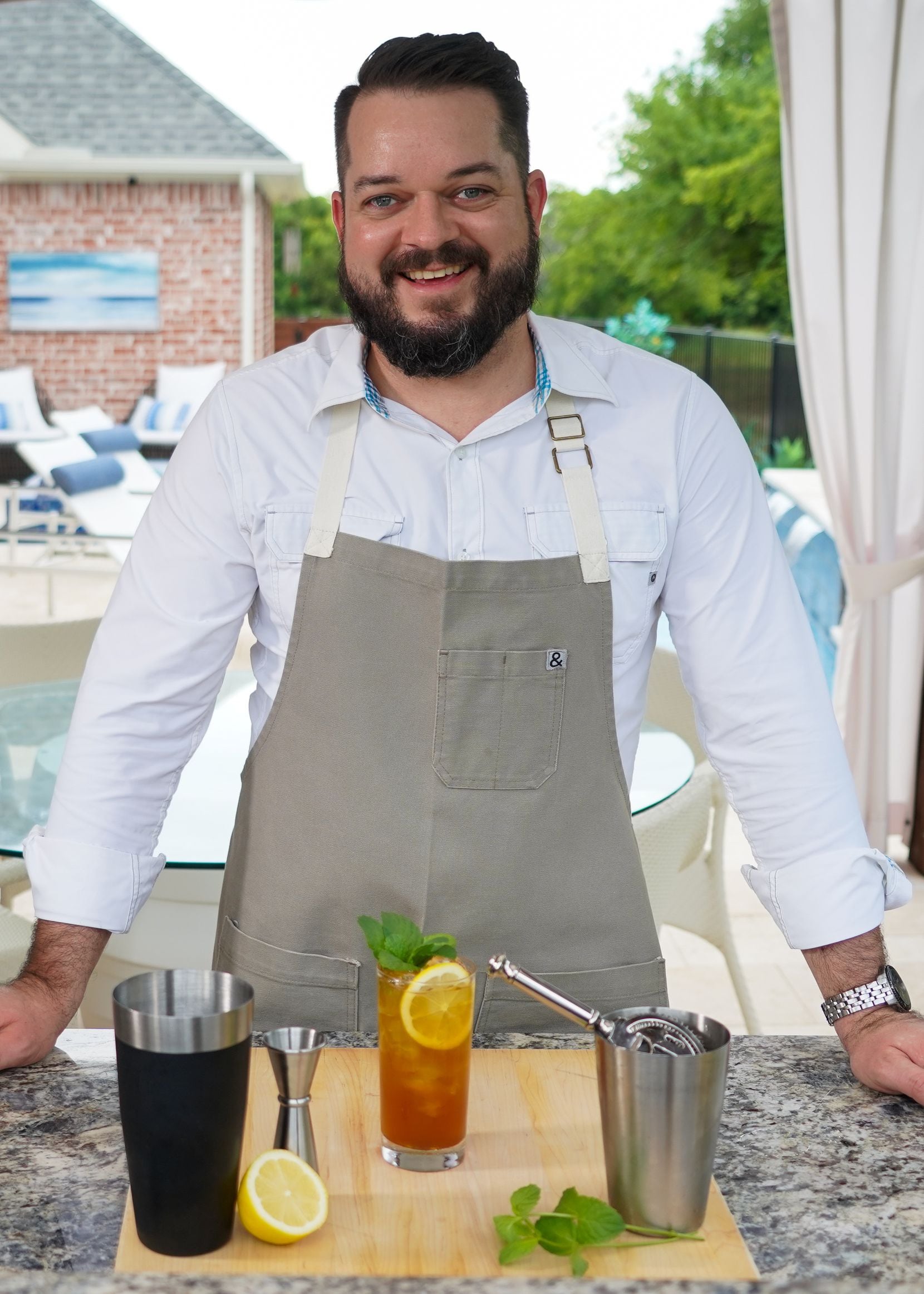 Brent Rogers, bartender for Gemma, makes a Buddha’s Tonic (a tea cocktail).