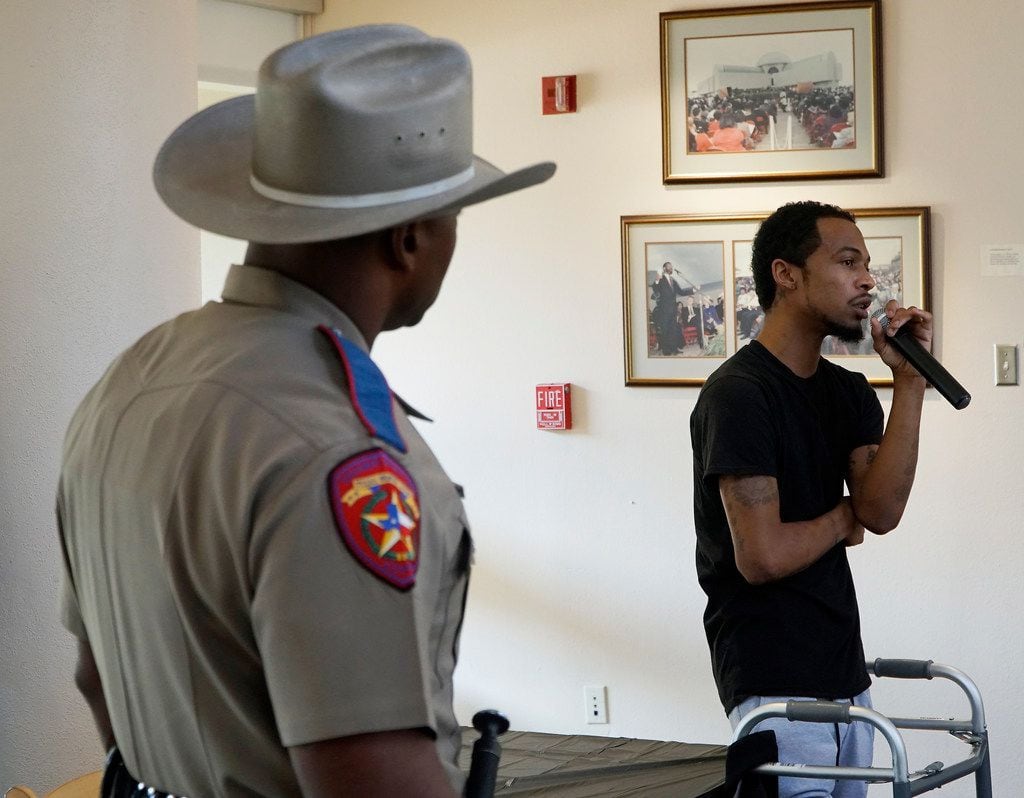 Dedrick Abrams (right) talks about being a victim of gun violence at the "Stop The Violence Community Forum" at the African American Museum in Dallas, Texas on Saturday, September 14, 2019. Abrams was shot multiple times, left for dead, and found by two state troopers. 