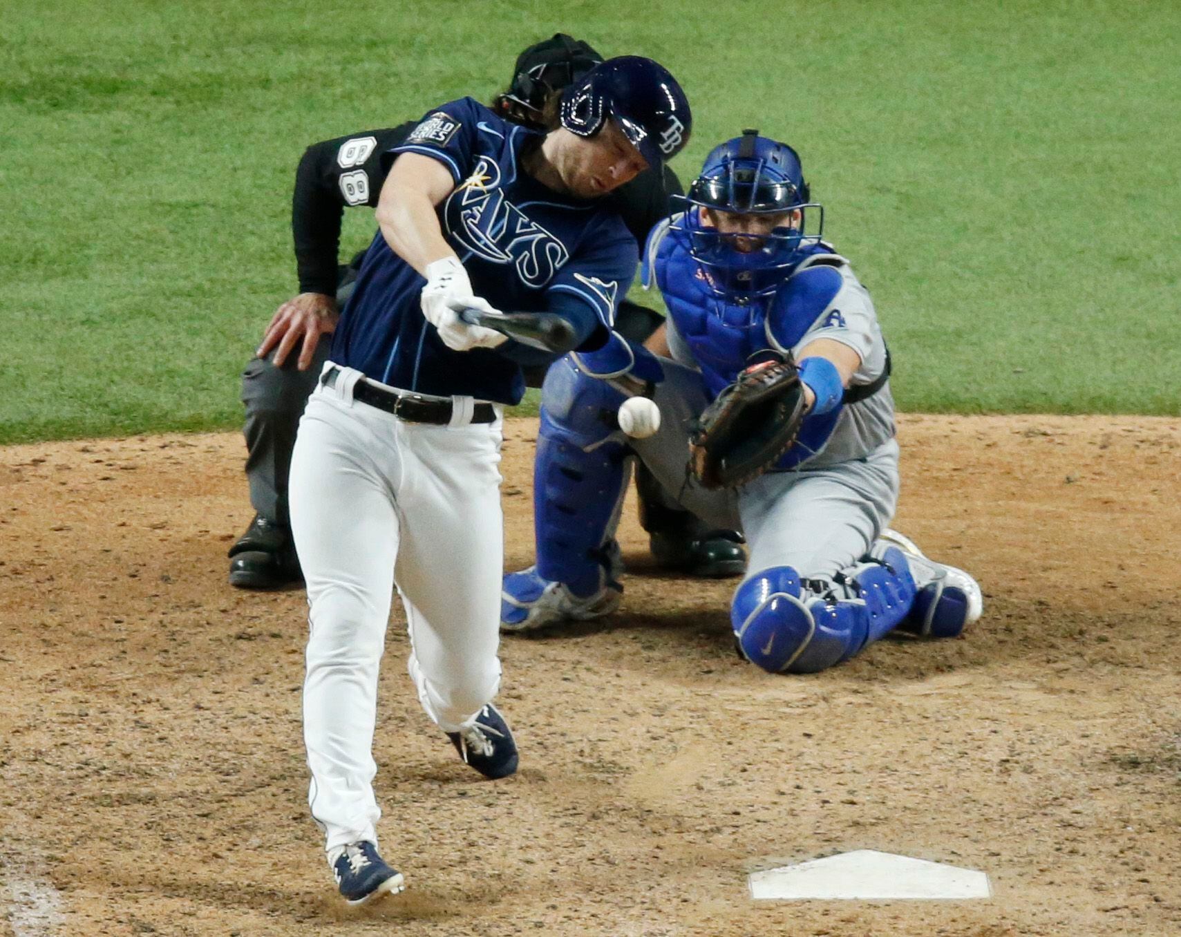 Photos: Randy Arozarena lays on home plate after game-winning run, Rays  celebrate victory over Dodgers